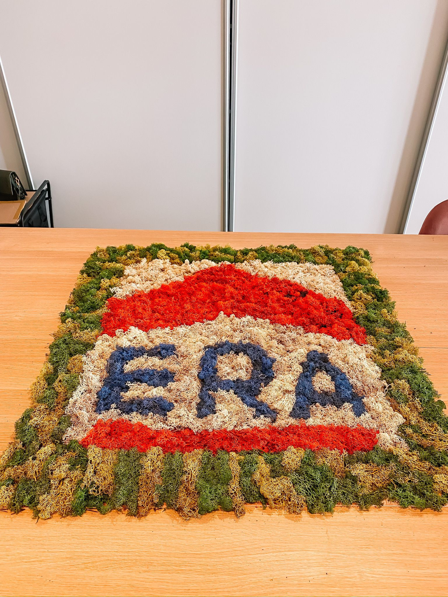 Moswand logo voor bedrijven workshop - Foto