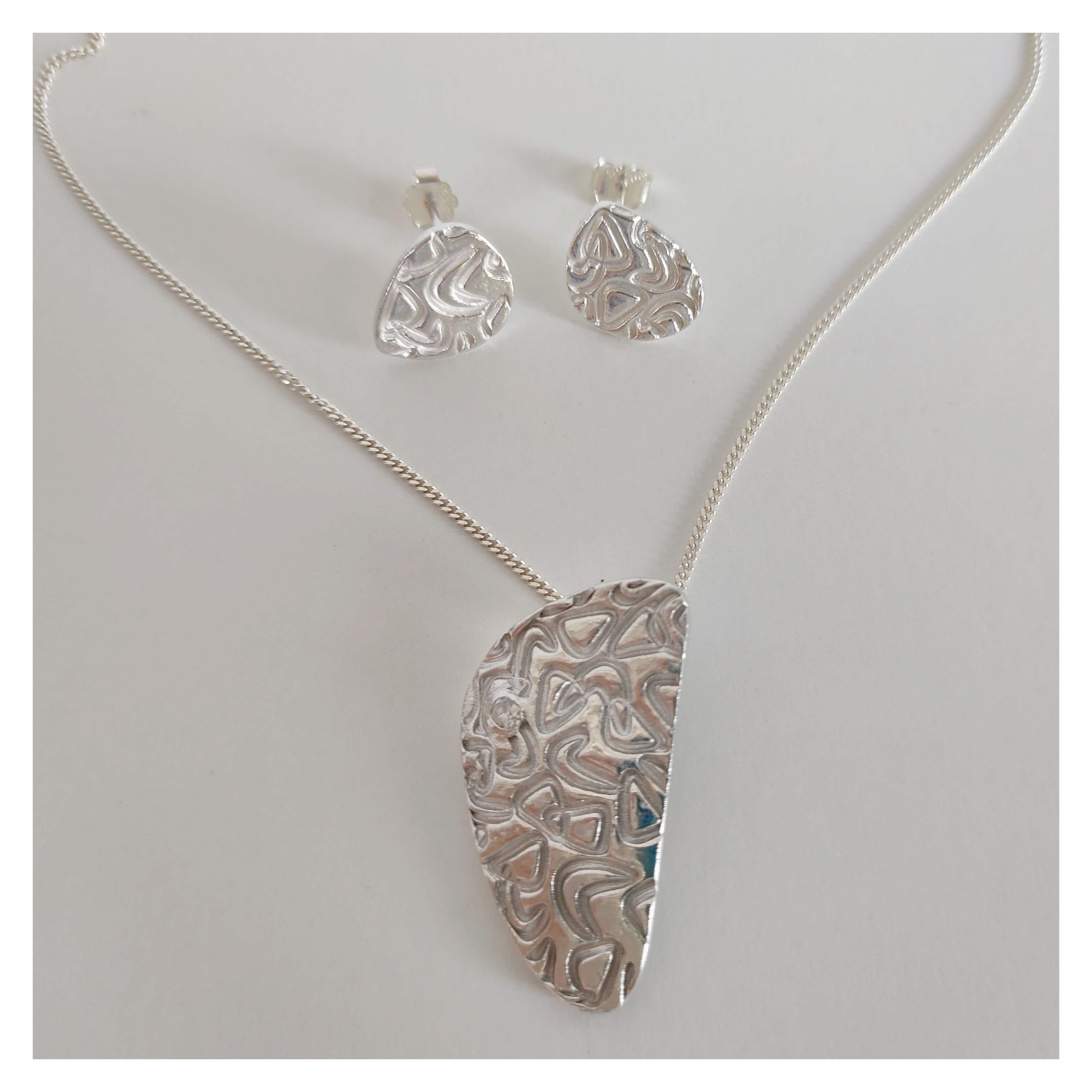 Workshop hanger en/of oorbellen in zilverklei - Foto