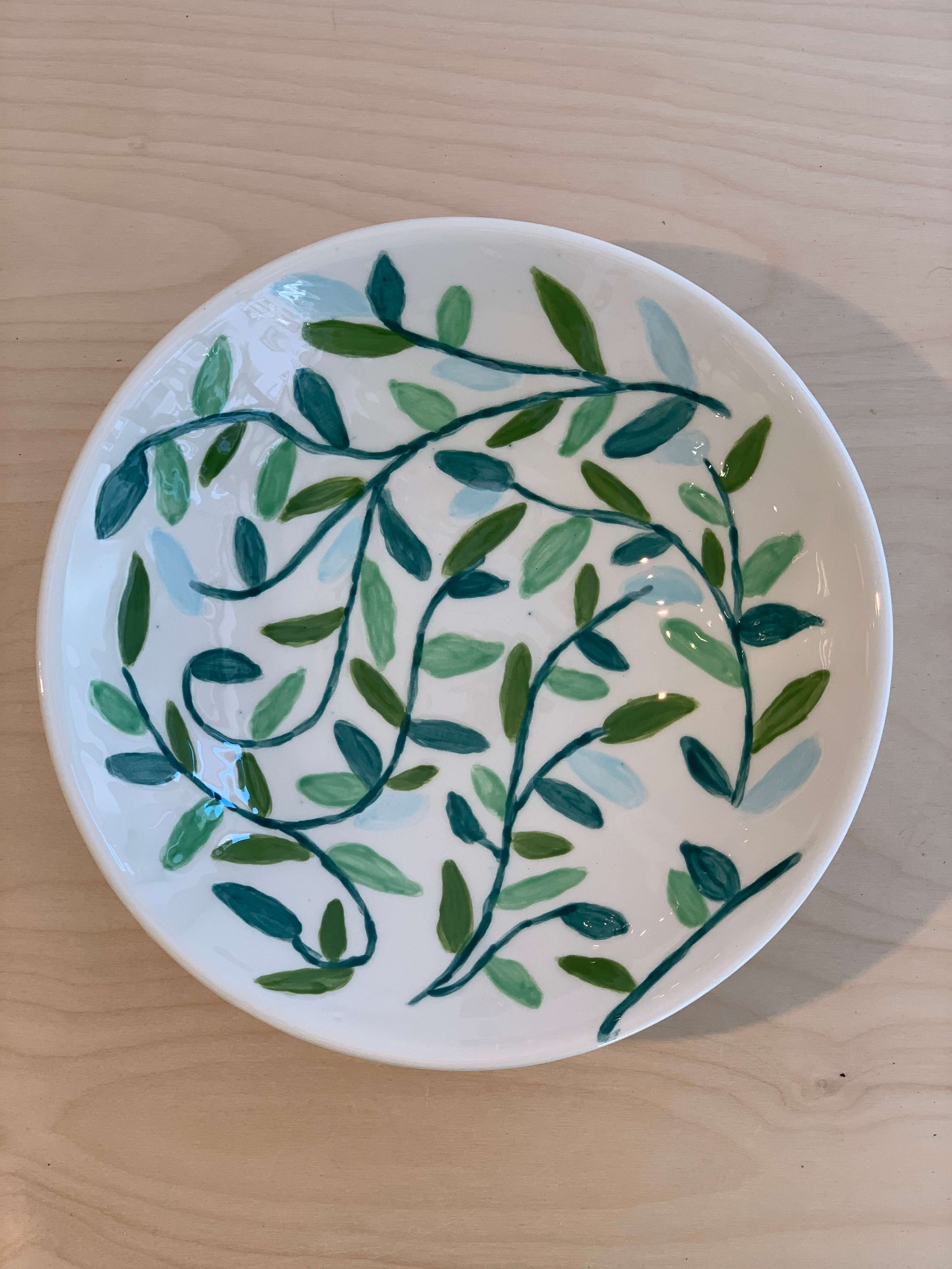 Teambuilding Pottery Painting. Decoreer je servies. - Foto