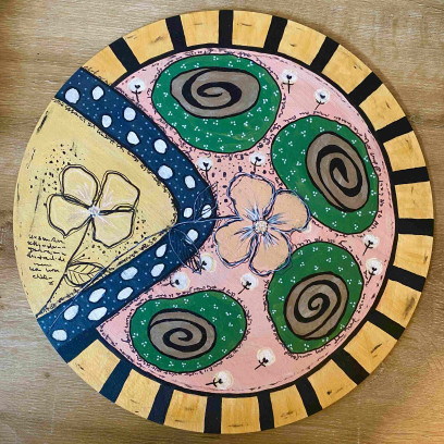 Houten muurcirkel (40cm) versieren.