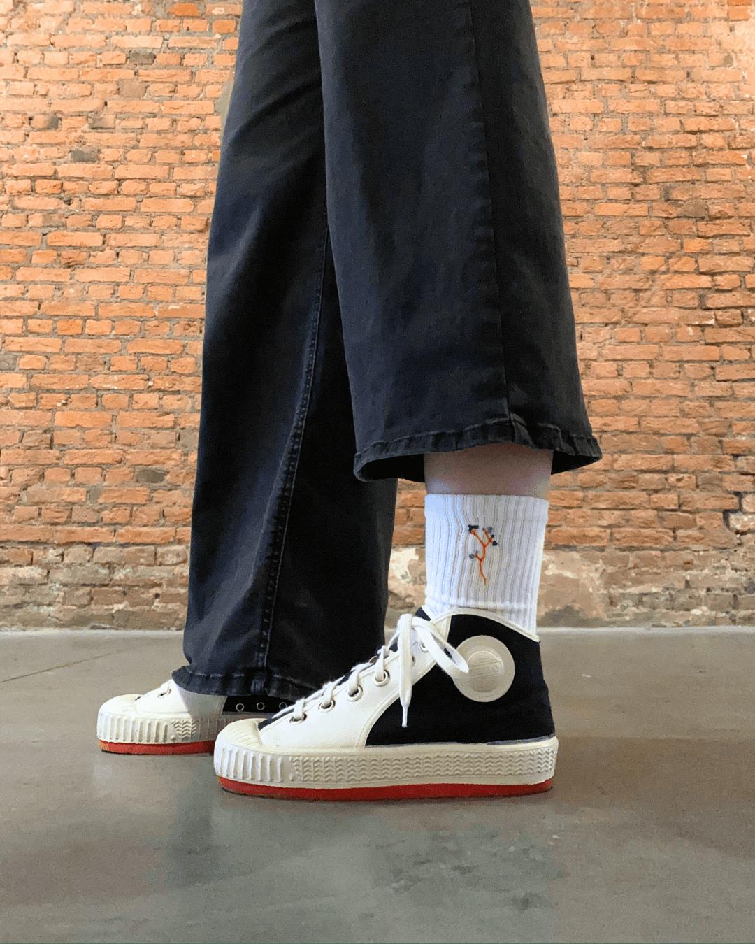 Borduren op sokken - Foto