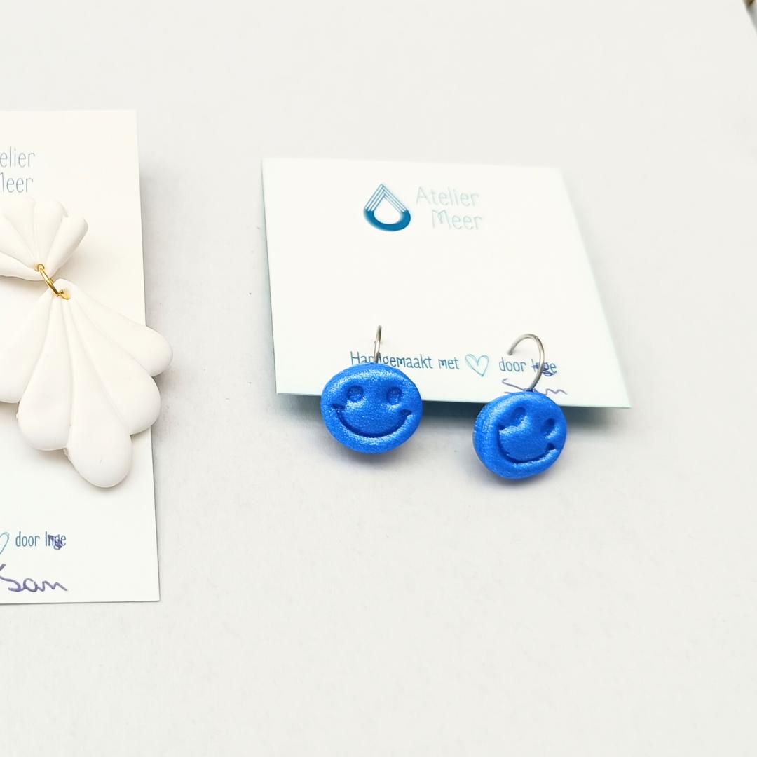 Juweeltjes maken uit polymeerklei (ouder-kind workshop) - Foto