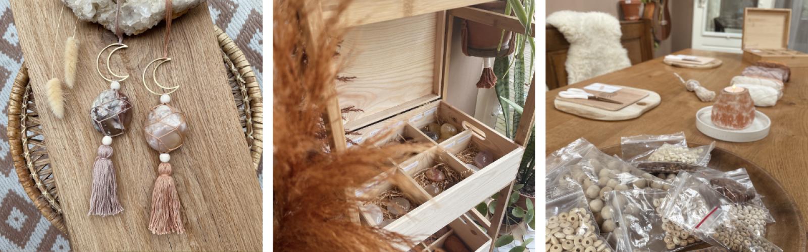 Handgemaakte edelsteenhangers met maanvormige details en kwastjes, een houten opbergdoos gevuld met verschillende edelstenen en materialen, en een werktafel met kralen, touw en accessoires klaar om verwerkt te worden.