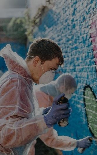 Workshop Graffiti op muur (speelplaats, gemeente,...) - Foto