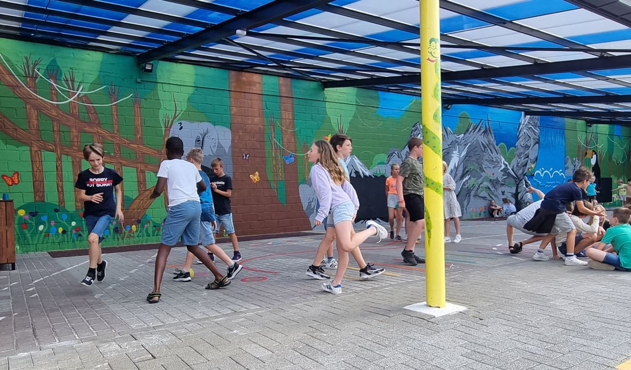 Workshop Graffiti op muur (speelplaats, gemeente,...) - Foto